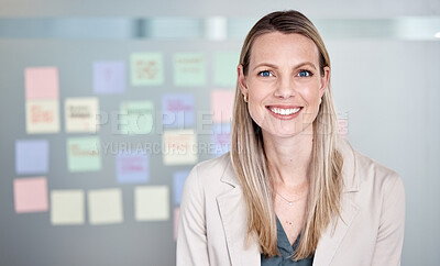 Buy stock photo Portrait of a businesswoman with sticky notes up on a board behind her