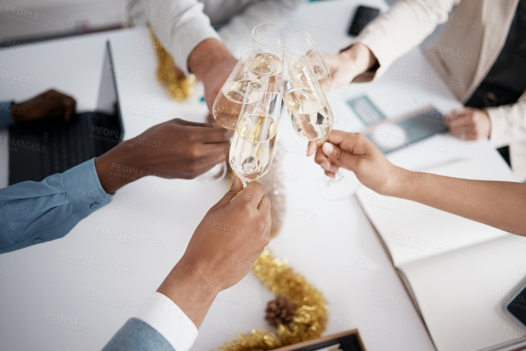 Buy stock photo Hands, champagne and achievement for toast at office with congratulations, goals or winner circle at Christmas. People, group and above for success, team building or celebration at party in workplace