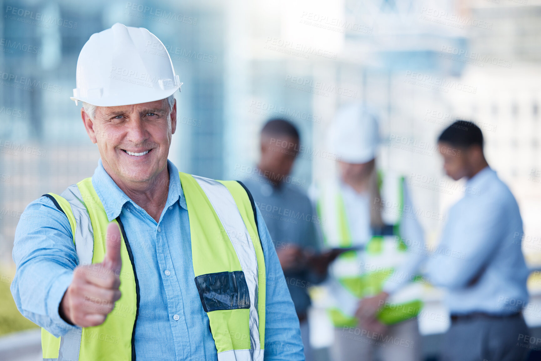 Buy stock photo Portrait, thumbs up and a senior man construction worker outdoor on a building site with his team in the background. Management, motivation and support with a  mature male architect saying thank you