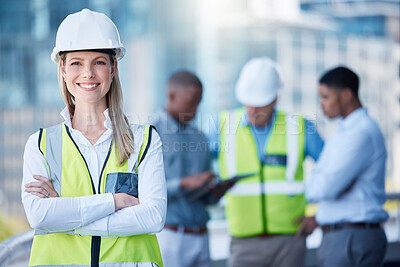 Buy stock photo Portrait, arms crossed and a woman construction worker outdoor on a building site with her team in the background. Management, leadership and confidence with a female architect standing outside