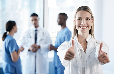 Buy stock photo Doctor, woman and thumbs up in portrait at hospital for agreement, choice or good news for wellness. Medic, person and happy for emoji, like or sign with vote for healthcare service by team in clinic