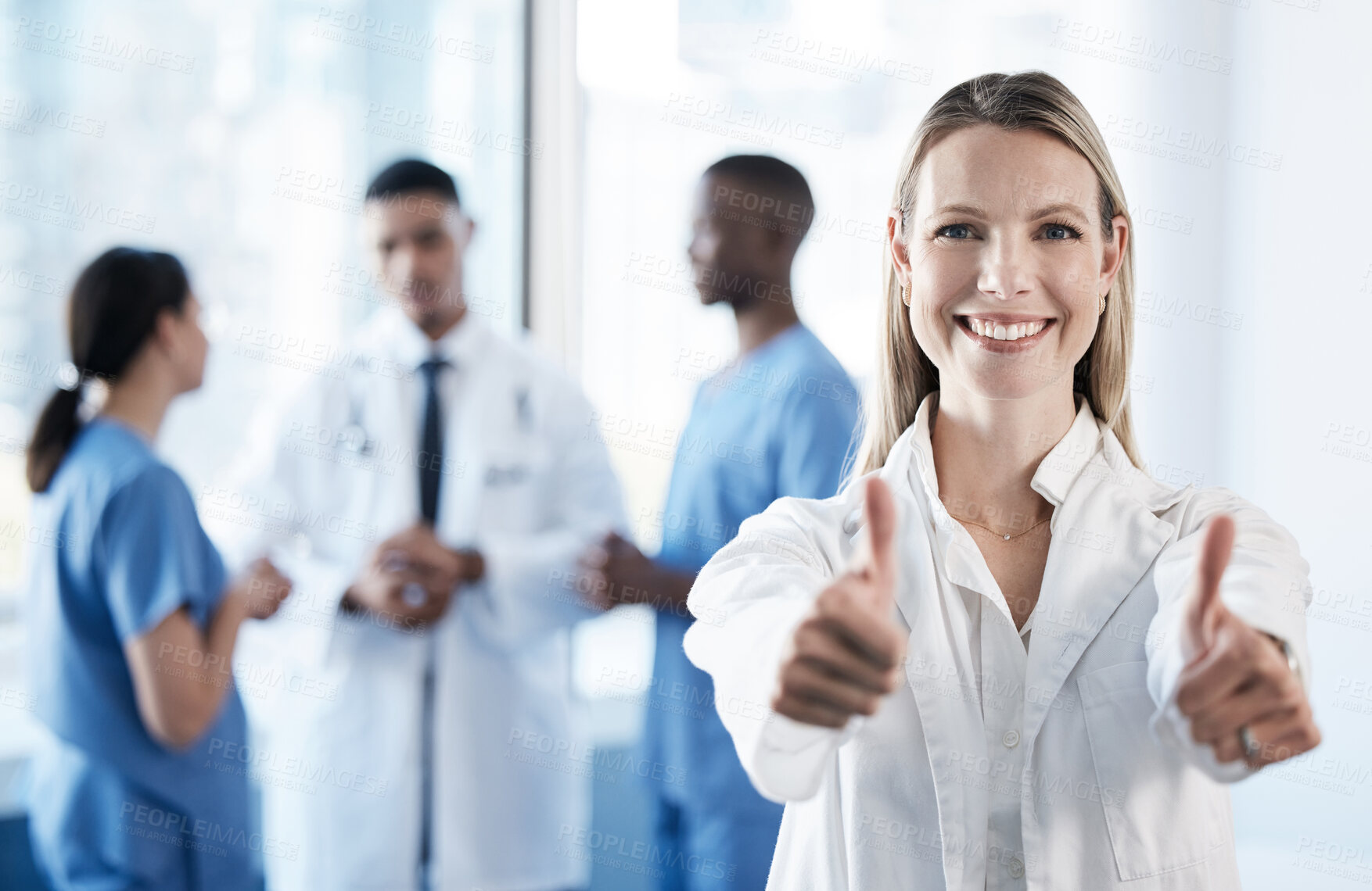 Buy stock photo Doctor, woman and thumbs up in portrait at hospital for agreement, choice or good news for wellness. Medic, person and happy for emoji, like or sign with vote for healthcare service by team in clinic