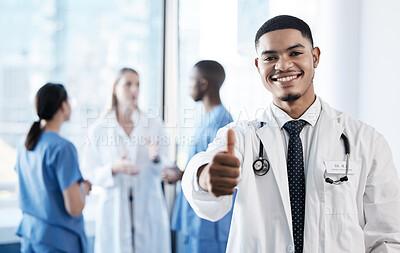 Buy stock photo Doctor, man and thumbs up in portrait at clinic for agreement, choice or good news for wellness. Medic, person and happy with emoji, like or sign for vote with healthcare services by team in hospital