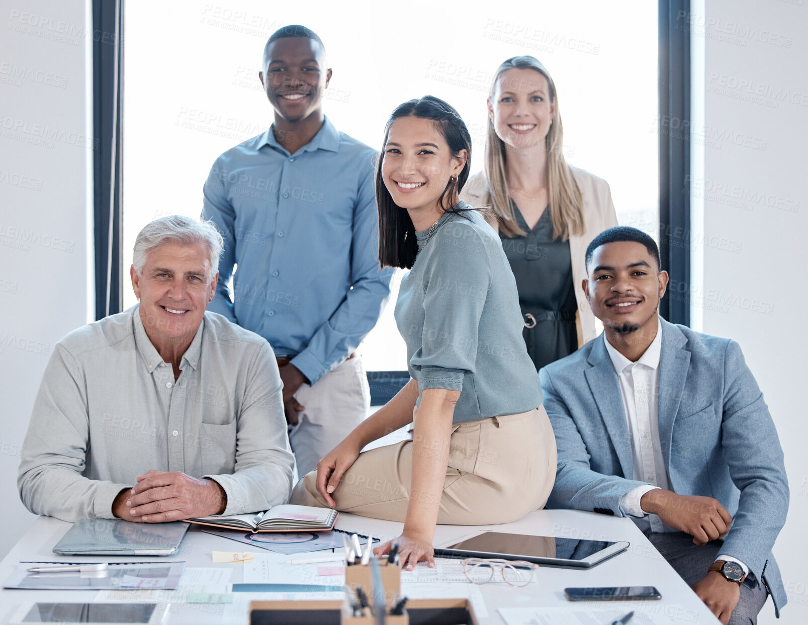 Buy stock photo Portrait, smile and group of business people with collaboration for coworking and project meeting in office. Happy teamwork or support and corporate staff by desk for discussion and planning strategy