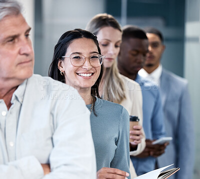 Buy stock photo Portrait of a young businesswoman waiting in line in an office