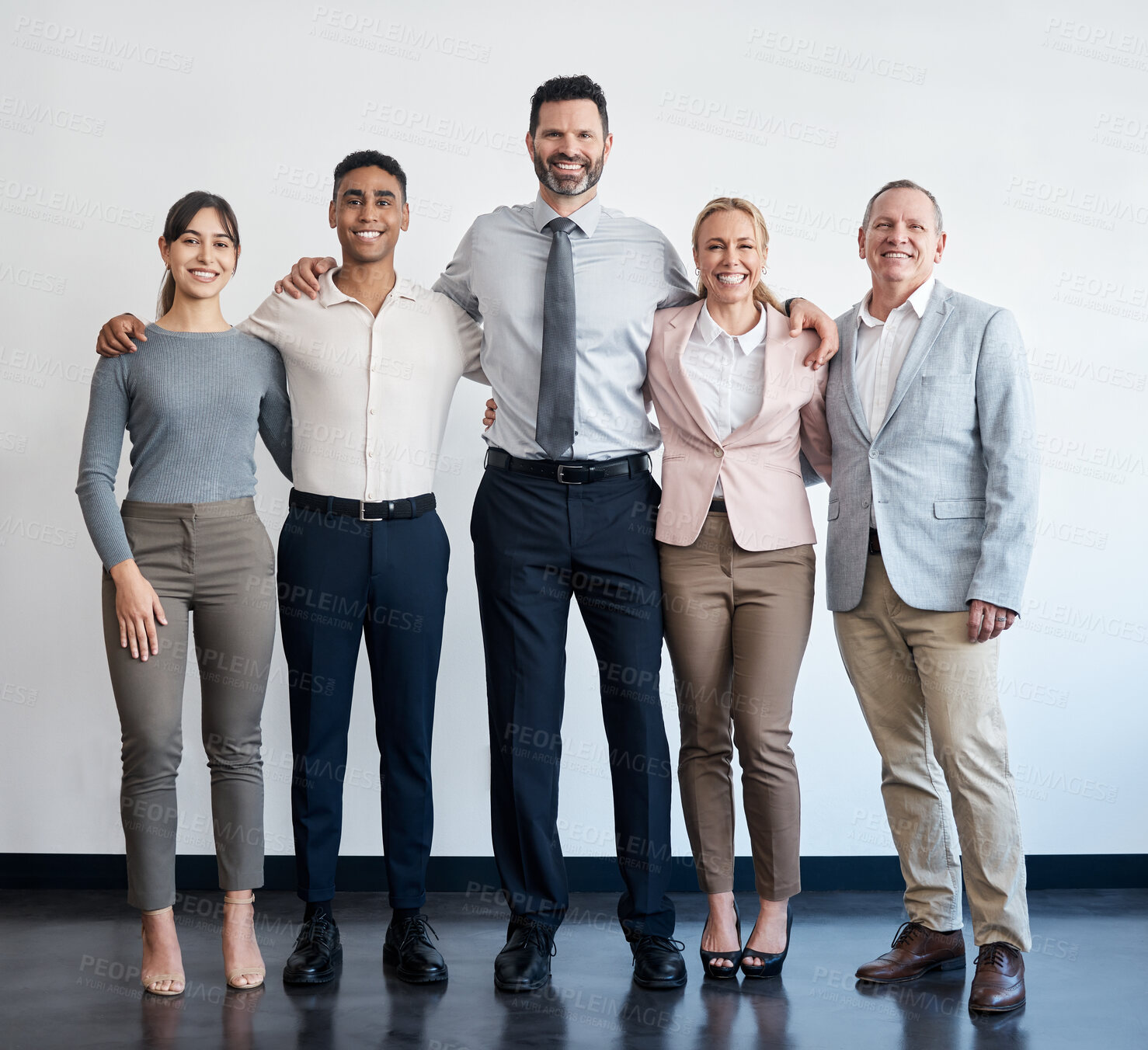 Buy stock photo Shot of a group of businesspeople standing in an office at work