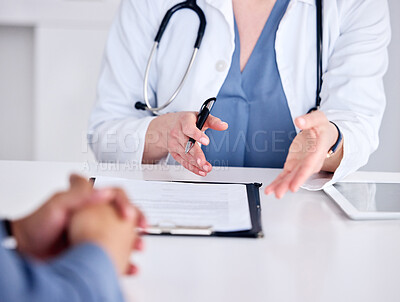 Buy stock photo Shot of an unrecognizable doctor having a consultation with a patient at a clinic