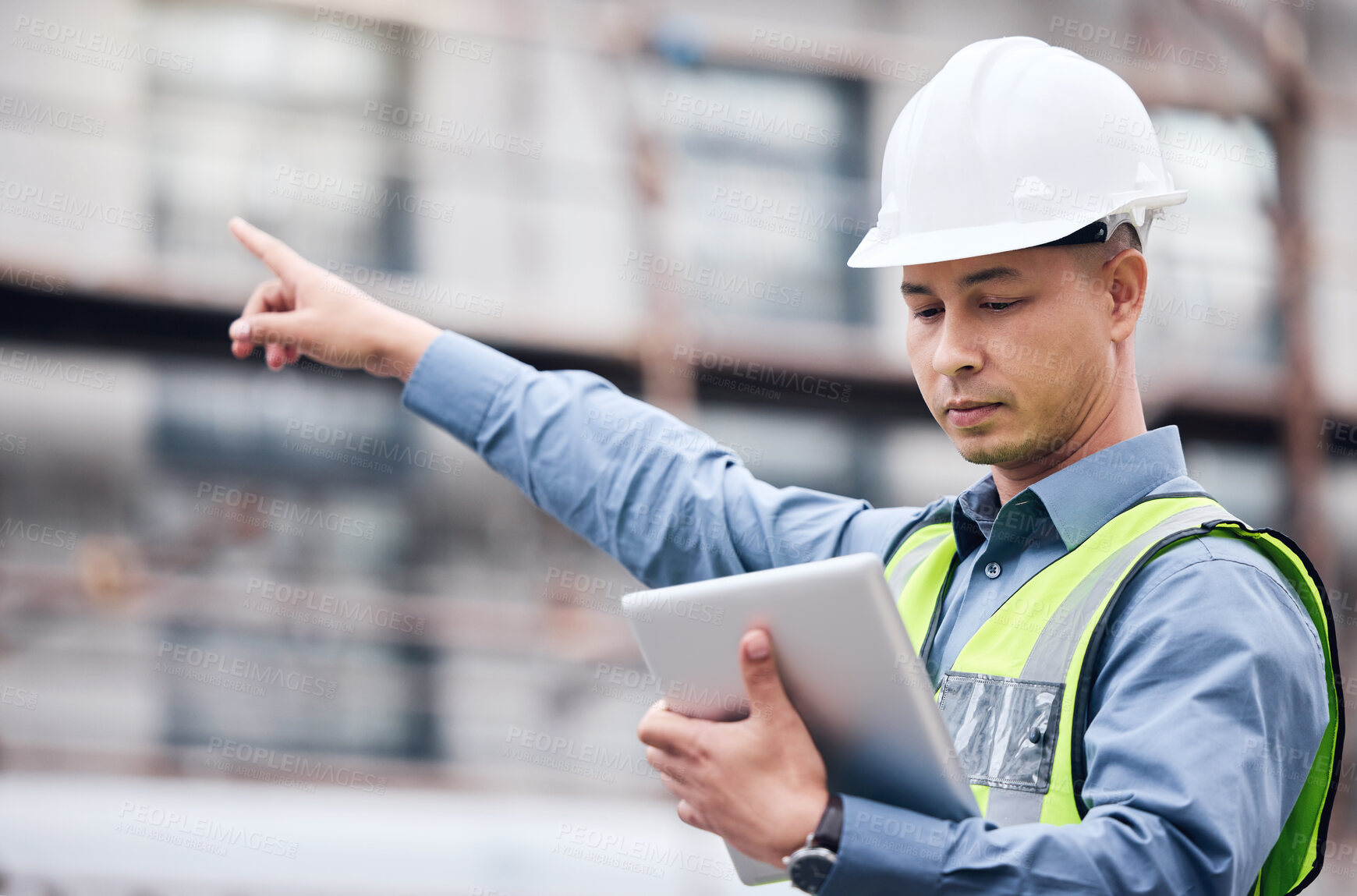 Buy stock photo City, tablet and man engineer pointing to construction site for real estate development with ppe safety. Architect guy, tech app notification and show urban building for inspection and maintenance