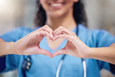 Buy stock photo Happy woman, doctor and heart shape hands for love in healthcare or life insurance at the hospital. Female person or medical professional showing hand loving emoji, symbol or sign gesture at clinic