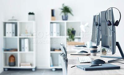 Buy stock photo Shot of a workspace in a call centre