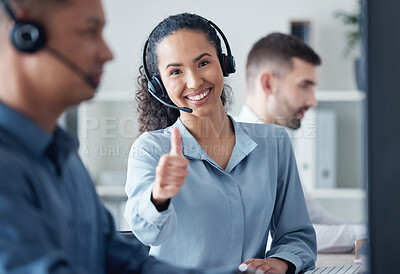 Buy stock photo Woman at callcenter, thumbs up in portrait and CRM, communication of support and agreement emoji. Contact us, customer service and tech, female agent with headset and smile, success and thank you