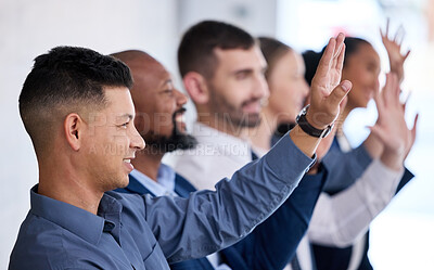 Buy stock photo Shot of a group of businesspeople raising their hands in an office at work