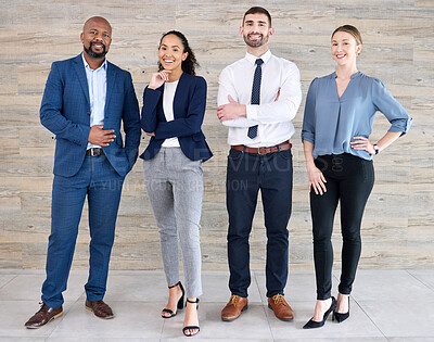 Buy stock photo Shot of a group of businesspeople standing in an office at work