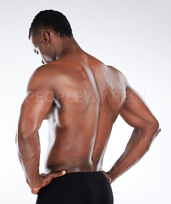 Buy stock photo Black man, body and back muscle in studio on white background for fitness, goals and workout or training results. Bodybuilder, sports athlete or model for health, wellness and strong confidence