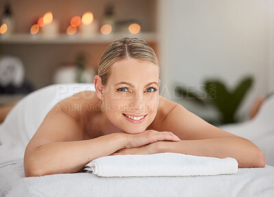 Buy stock photo Portrait, relax and massage with a woman lying in spa for wellness treatment at a luxury resort on vacation. Bed, zen or beauty of female customer indoors for stress relief from natural therapy