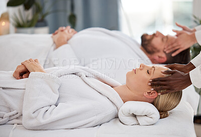 Buy stock photo Shot of a couple getting a message in a spa