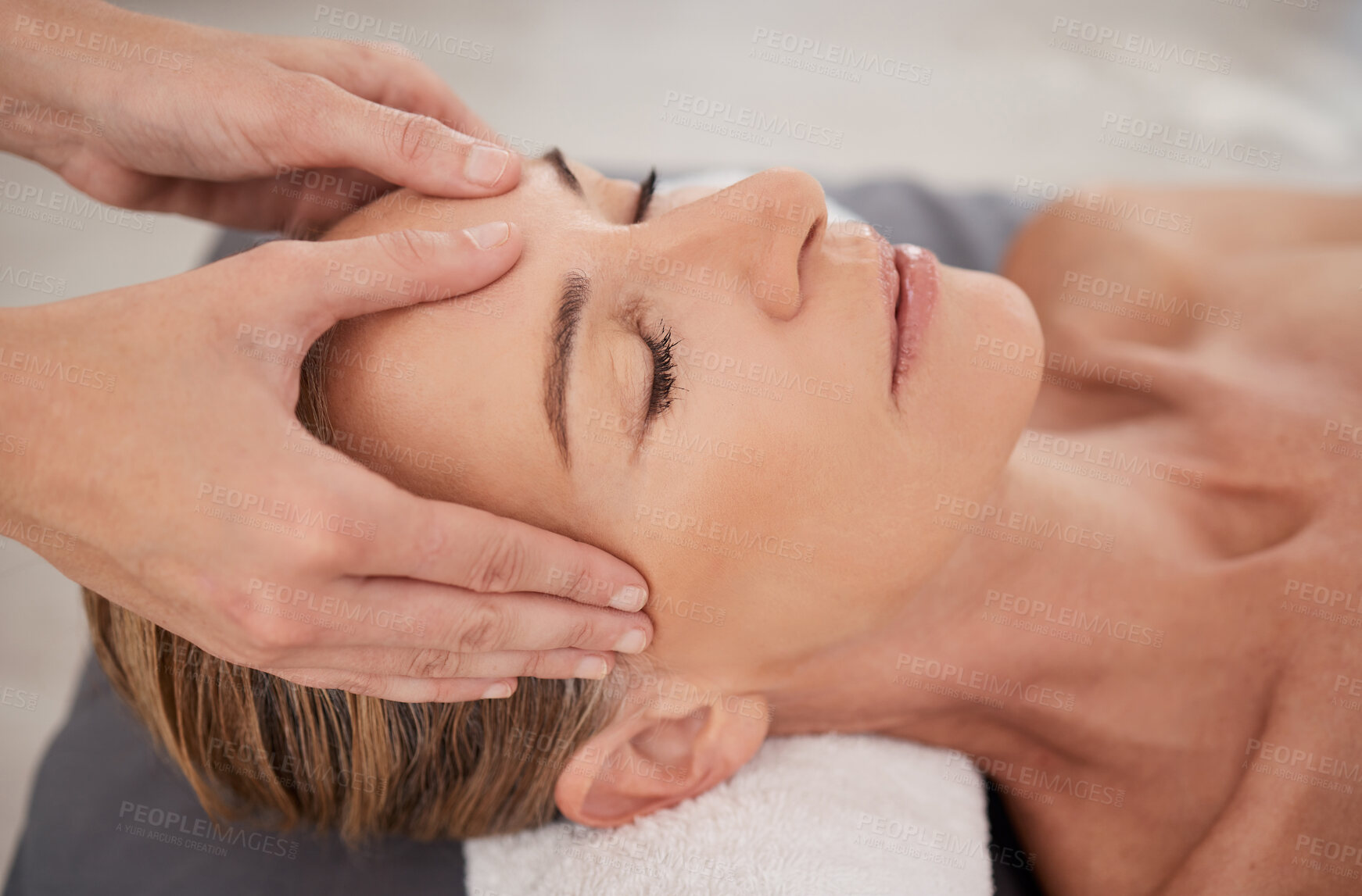 Buy stock photo Spa, treatment and hands with a head massage for facial wellness, luxury therapy and sleep. Skincare, health and a masseuse massaging temple of a woman at a salon for reflexology and acupressure