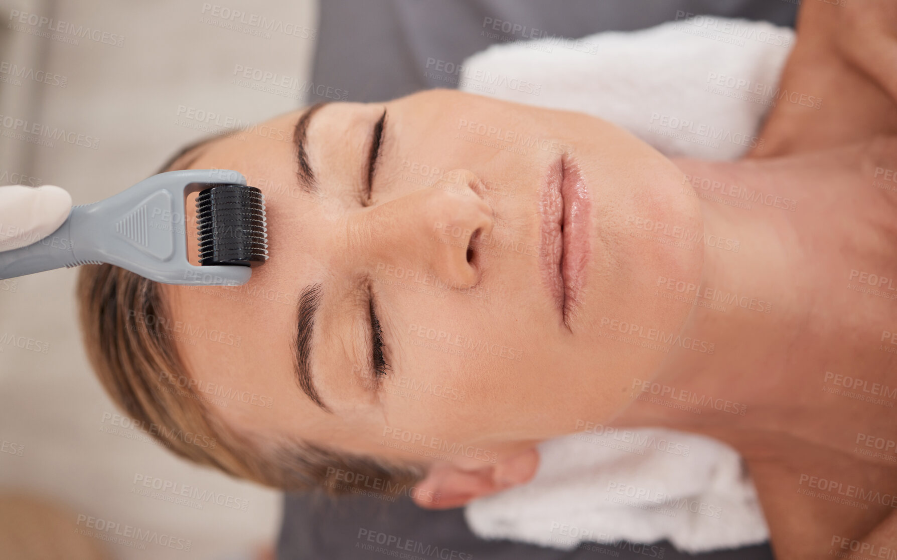 Buy stock photo Woman, face and needle with derma roller above in skincare, beauty or microneedling at spa. Top view of female person sleeping with tool for facial massage, cosmetology or wellness at salon or resort