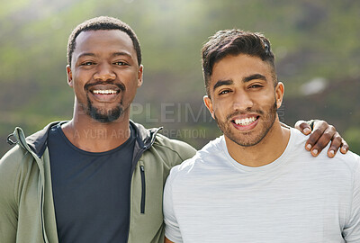 Buy stock photo Portrait of two sporty young men exercising together outdoors