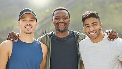 Buy stock photo Portrait of a group of sporty young men standing together in a huddle while exercising outdoors