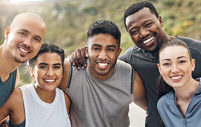 Buy stock photo Shot of a group of people out for a workout together on a mountain road