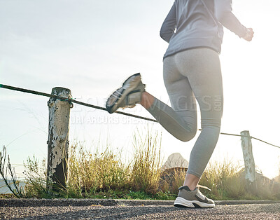 Buy stock photo Cropped shot of a woman out for a run