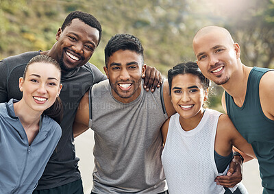 Buy stock photo Shot of a group of people out for a workout together on a mountain road