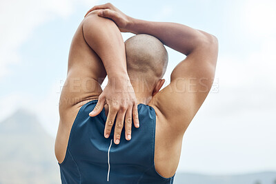 Buy stock photo Rearview shot of a man stretching outside