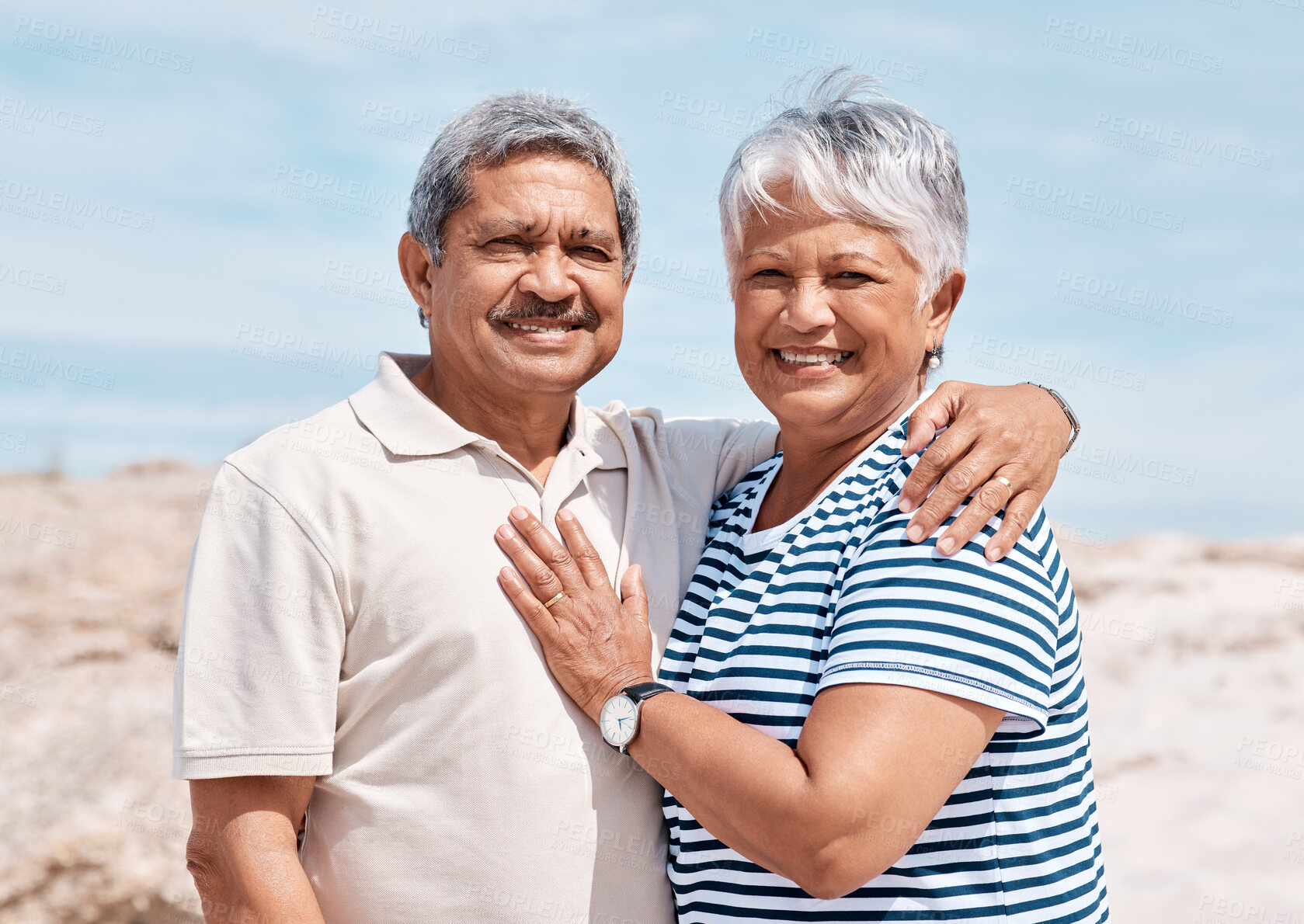 Buy stock photo Happy, portrait and old couple with hug on beach for retirement holiday, romantic trip and bonding. Love, senior people and smile with affection on coast for vacation support, connection and security