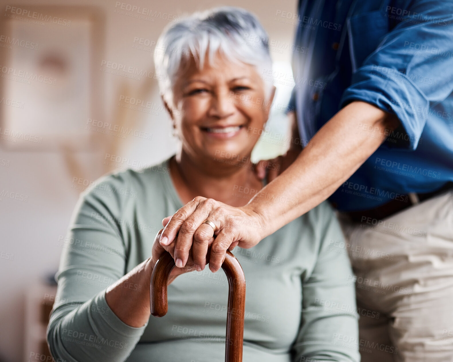 Buy stock photo Shot of a happy senior couple relaxing together at home