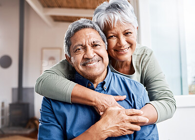 Buy stock photo Shot of a happy senior couple relaxing together at home