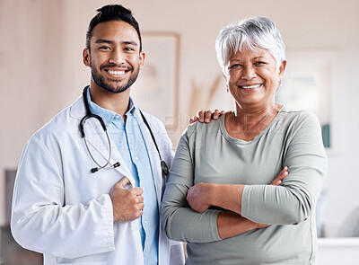 Buy stock photo Happy portrait, doctor and senior patient for healthcare, retirement wellness and hospital service. Smile, face and Biracial elderly woman with medical professional, worker or asian person for health