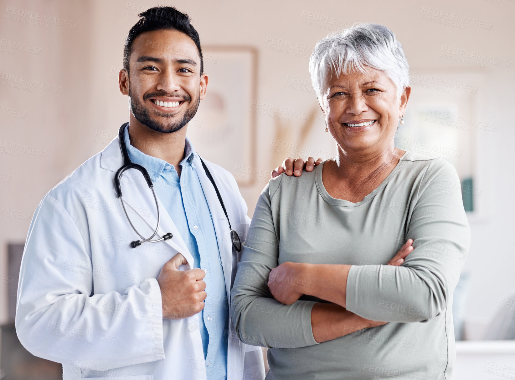 Buy stock photo Happy portrait, doctor and senior patient for healthcare, retirement wellness and hospital service. Smile, face and Biracial elderly woman with medical professional, worker or asian person for health