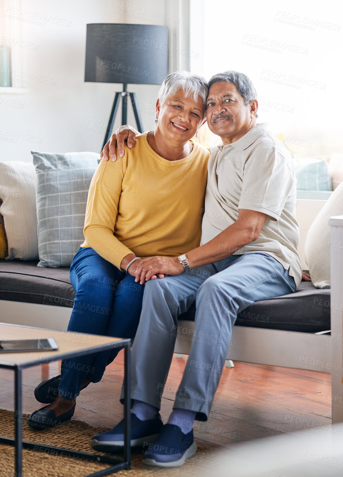 Buy stock photo Shot of a senior couple relaxing at home