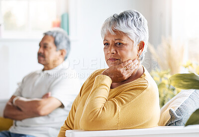 Buy stock photo Shot of a senior couple arguing at home