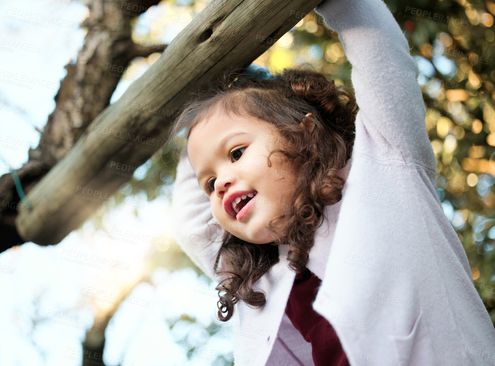 Buy stock photo Kid, happy and cheerful in playground, backyard or park for fun, joy and development as toddler. Girl, child and positive in outdoor with growth, learning and physical activity for learning as youth