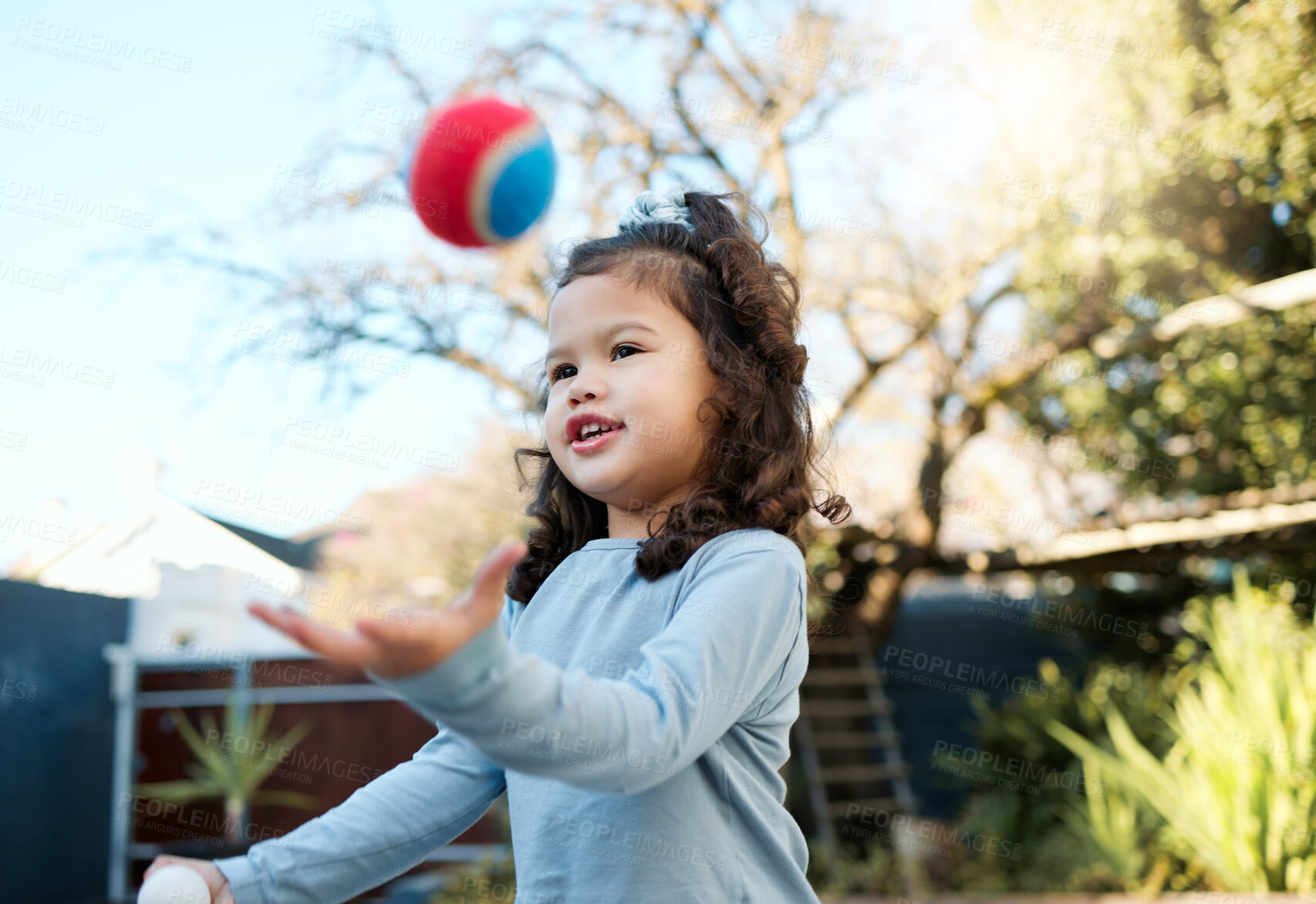 Buy stock photo Child, ball and happiness in playground, backyard or park for fun, joy and development as toddler. Girl, kid and positive in outdoor with growth, learning and physical activity for adventure as youth