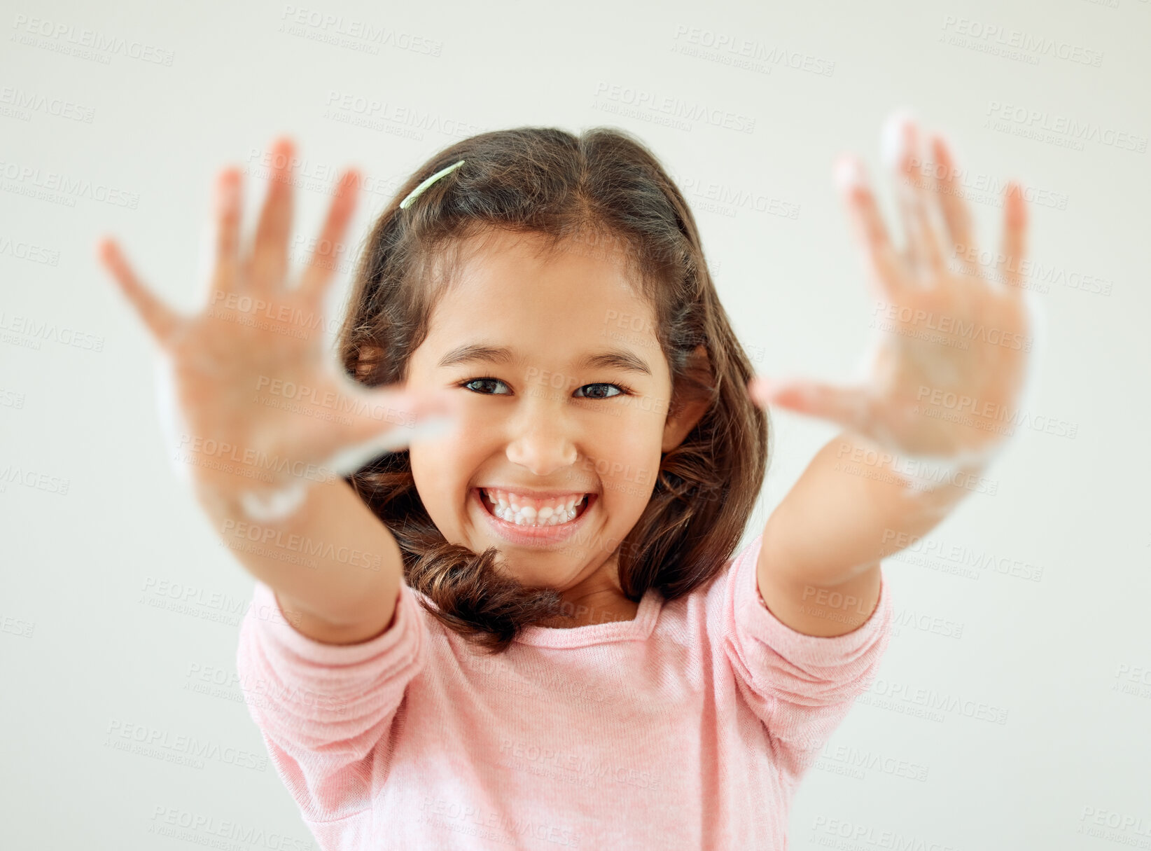 Buy stock photo Kid, portrait and showing hands with soap in bathroom for hygiene, sanitation and bacteria removal. Happy, girl and gesture with cleaning at home for germ disinfection, protection and health safety