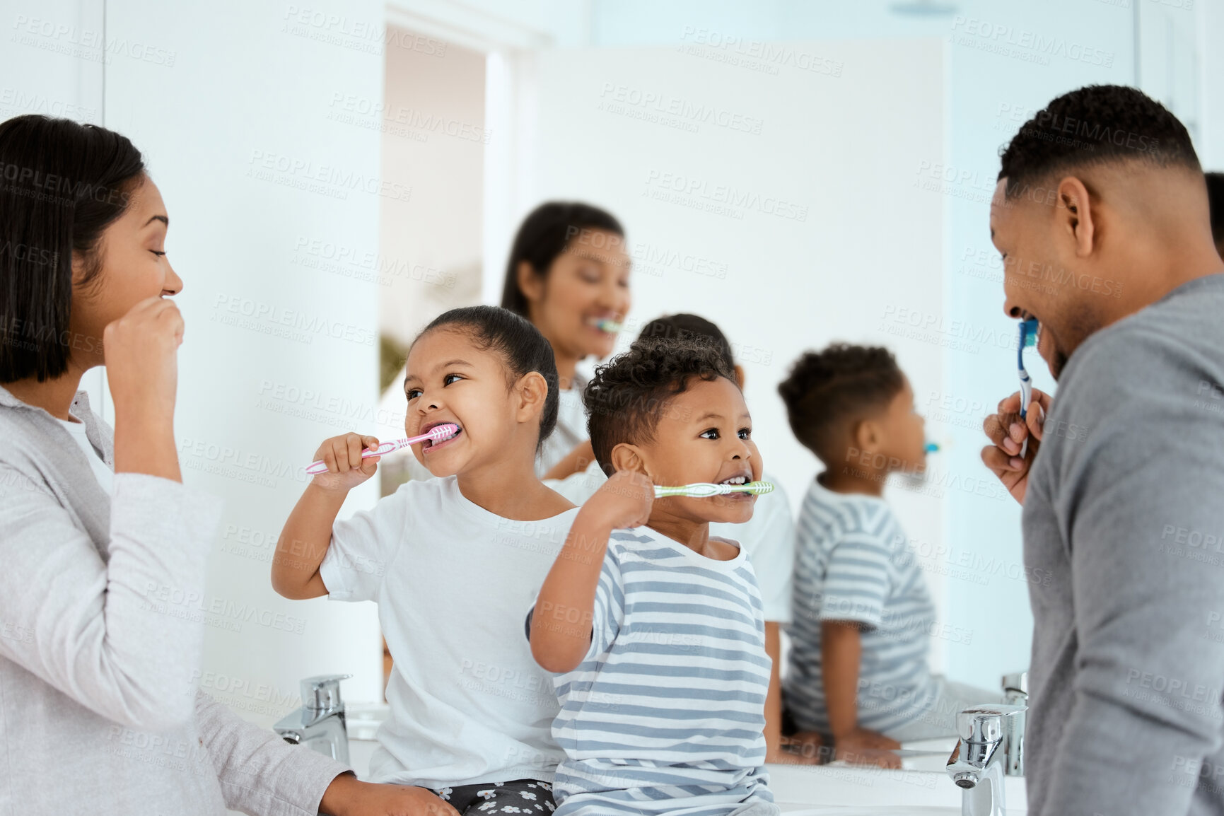 Buy stock photo Dental, family brush their teeth and in bathroom of their home together in the morning. Care or love with hygiene, wellness and black people cleaning for healthcare with toothbrush at their house