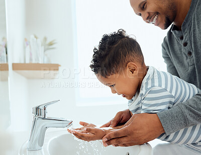 Buy stock photo Bathroom, father and child with support for washing hands, prevent germs and infectious disease in home. Safety, dad and little boy with water for hygiene care, wellness and cleaning dirt with parent