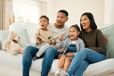 Buy stock photo Surprise, family and watching tv at house with streaming movie for love, care and bonding support in living room. Excited, parents and children and film show for wow, entertainment and subscription