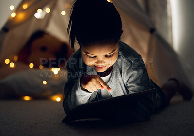 Buy stock photo House, dark and girl with tablet, bedroom and relax with internet, connection and ebook. Apartment, bedtime and happy kid with technology, evening and childhood with digital app, rest or website info