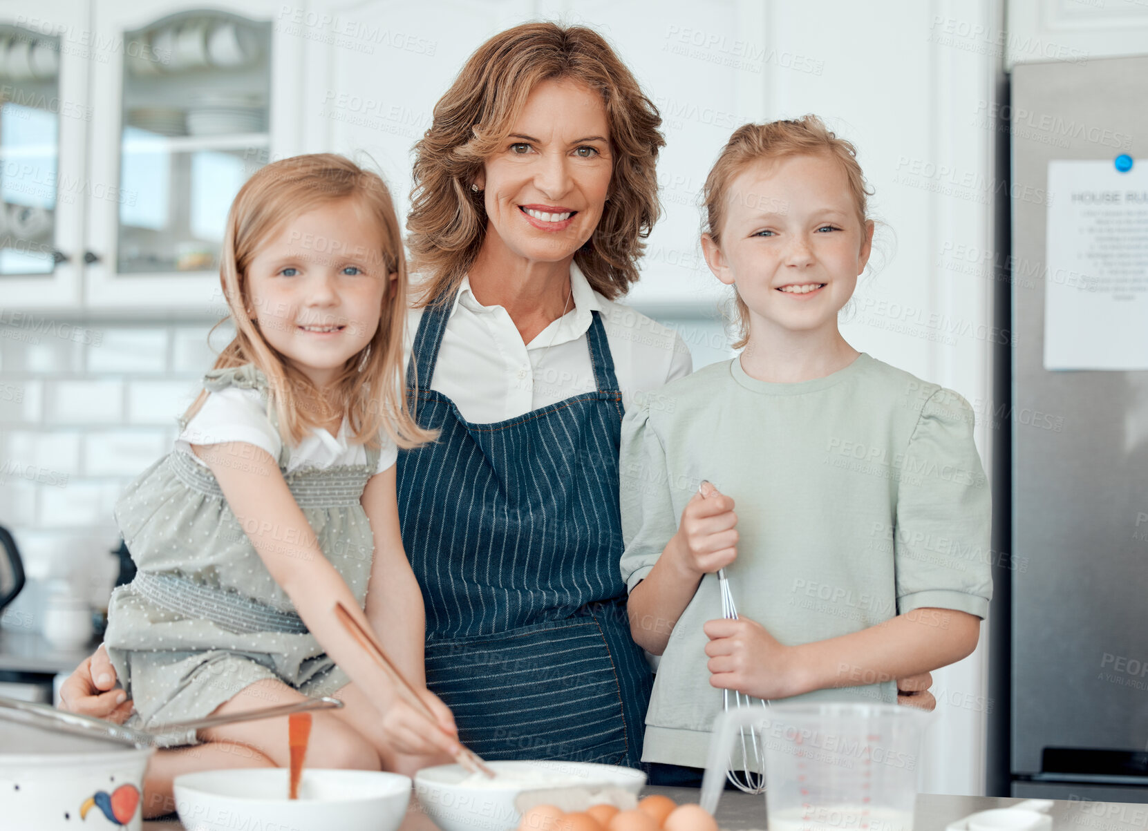 Buy stock photo Grandmother, portrait and children with home, kitchen and learning with ingredients for pastry or dessert cake. Happy smile, family and cooking kids help baking pudding, cookies or bakery recipe