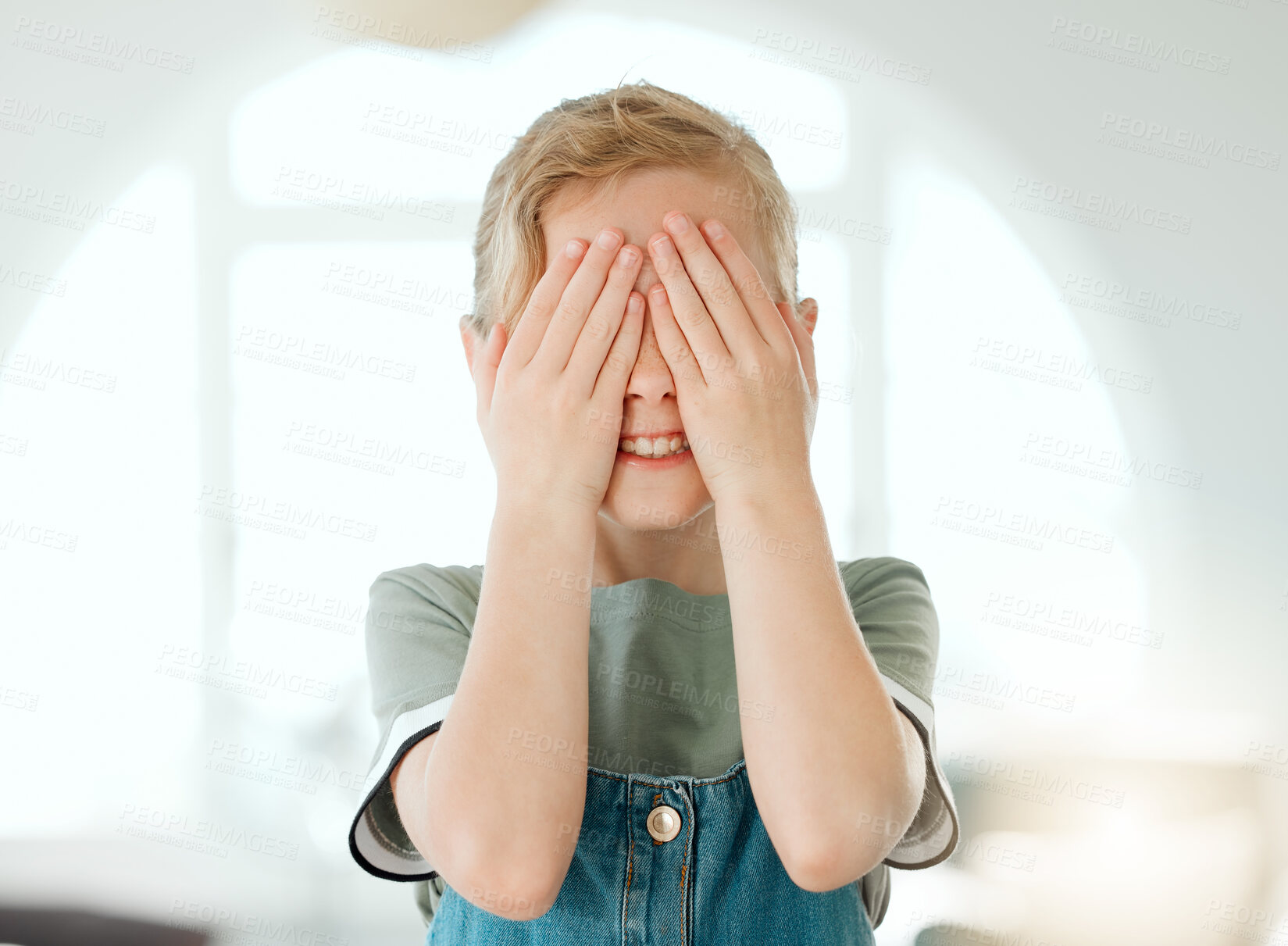 Buy stock photo Child, hands and cover eyes in home with game, play and blind emoji gesture with smile. Silly, fun and hide face for peekaboo with shy, happy and surprise of young girl with funny scared expression