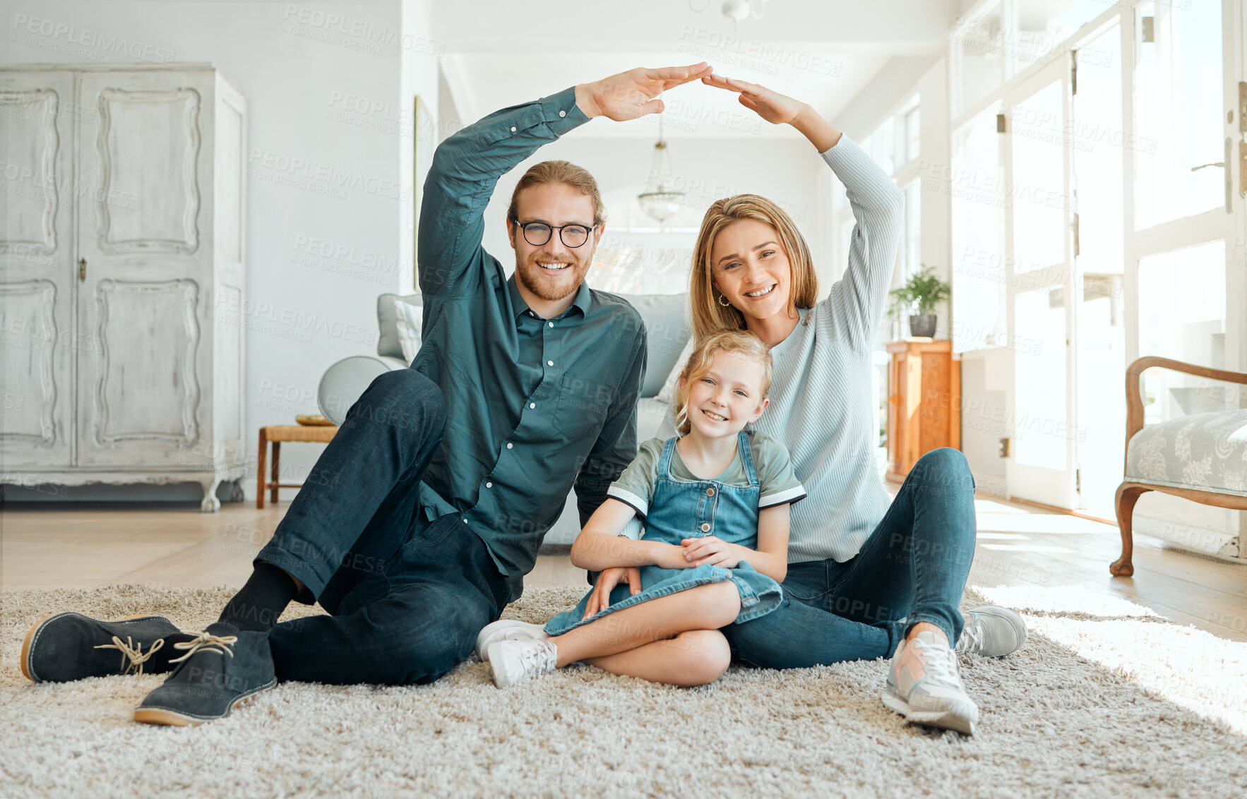 Buy stock photo Insurance, happy and family with portrait in house for real estate, safety and security in new home or mortgage. Dad, mom and girl with gesture with hands for roof, support and property investment.