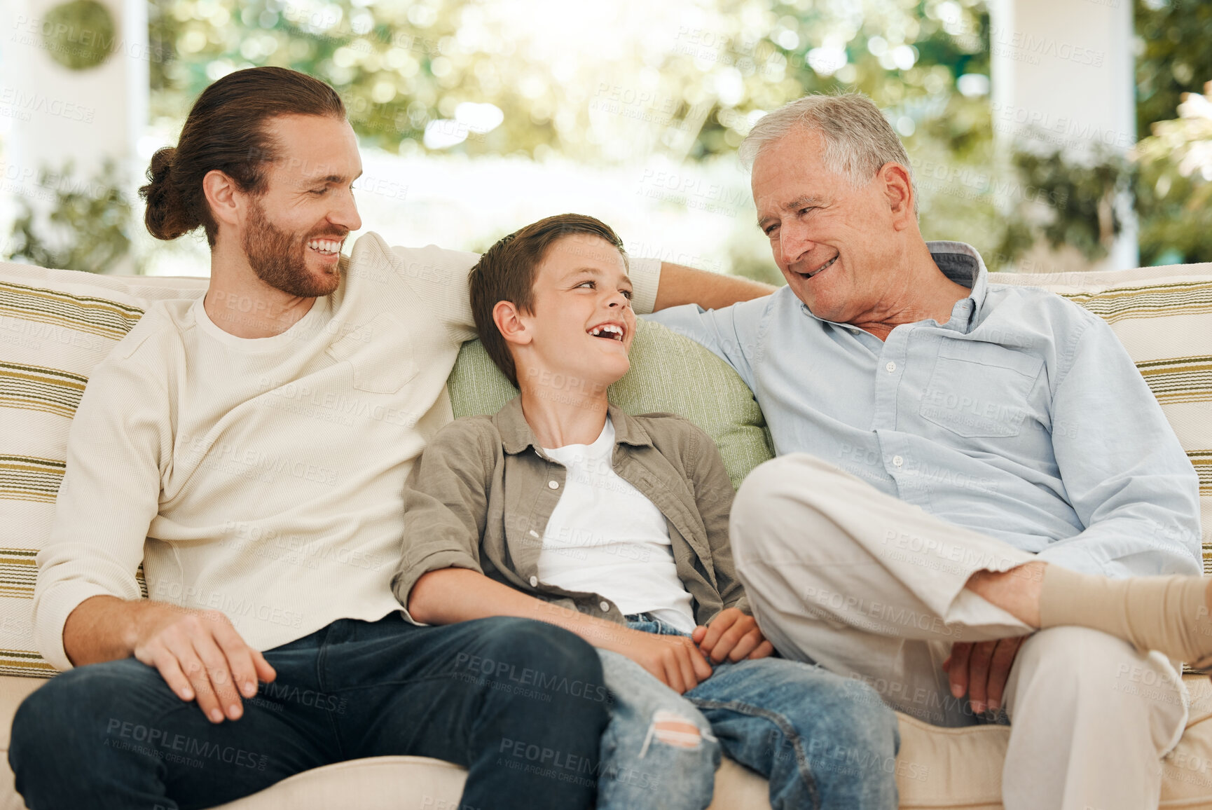 Buy stock photo Family, men or child on sofa for generations, love or visit to retirement home with smile. Grandfather, dad or son in living room for weekend relax, joking or happy for storytelling with laugh or fun