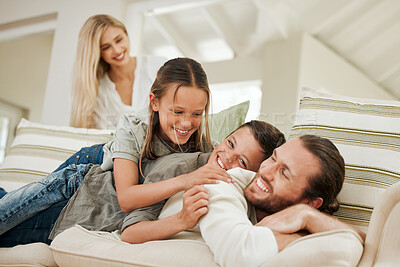 Buy stock photo Home, happy kids and family stack with father on sofa for love, care or bonding together in lounge. Smile, children and parents pile on couch with mother, people or siblings play or lying for support