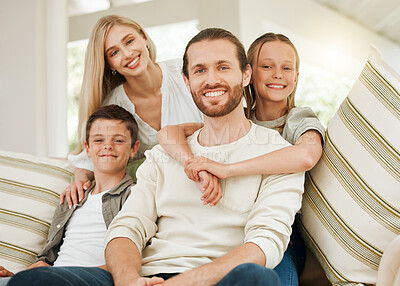 Buy stock photo Home, happy children or portrait of family with parents on sofa for love, care or boy bonding with girl. Face, mother and father with kids on couch or siblings hug for support in living room together