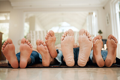 Buy stock photo Shot of a family lying down