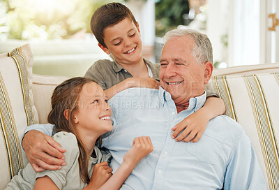 Buy stock photo Shot of a grandfather spending time with his grandchildren